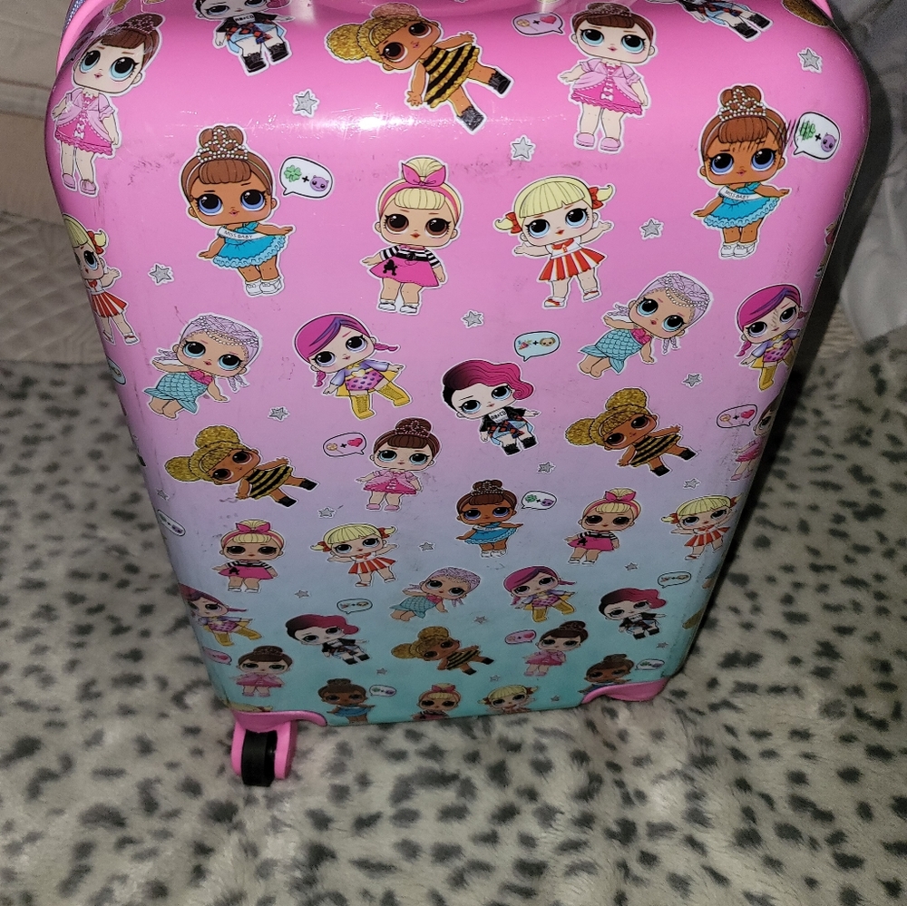 LOL Surprise hard suitcase with wheels. Super cute for your little traveler!